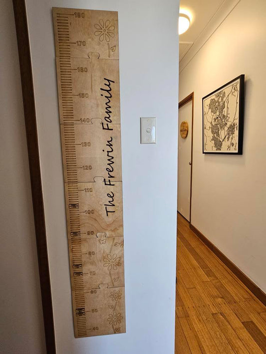 Personalised wooden wall mounted height chart with family name engraving