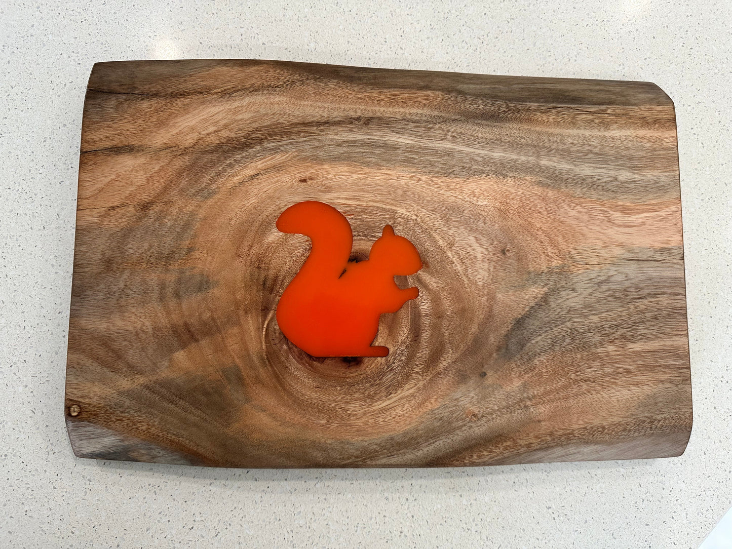 African Mahogany charcuterie board showing figured grain and resin inlay