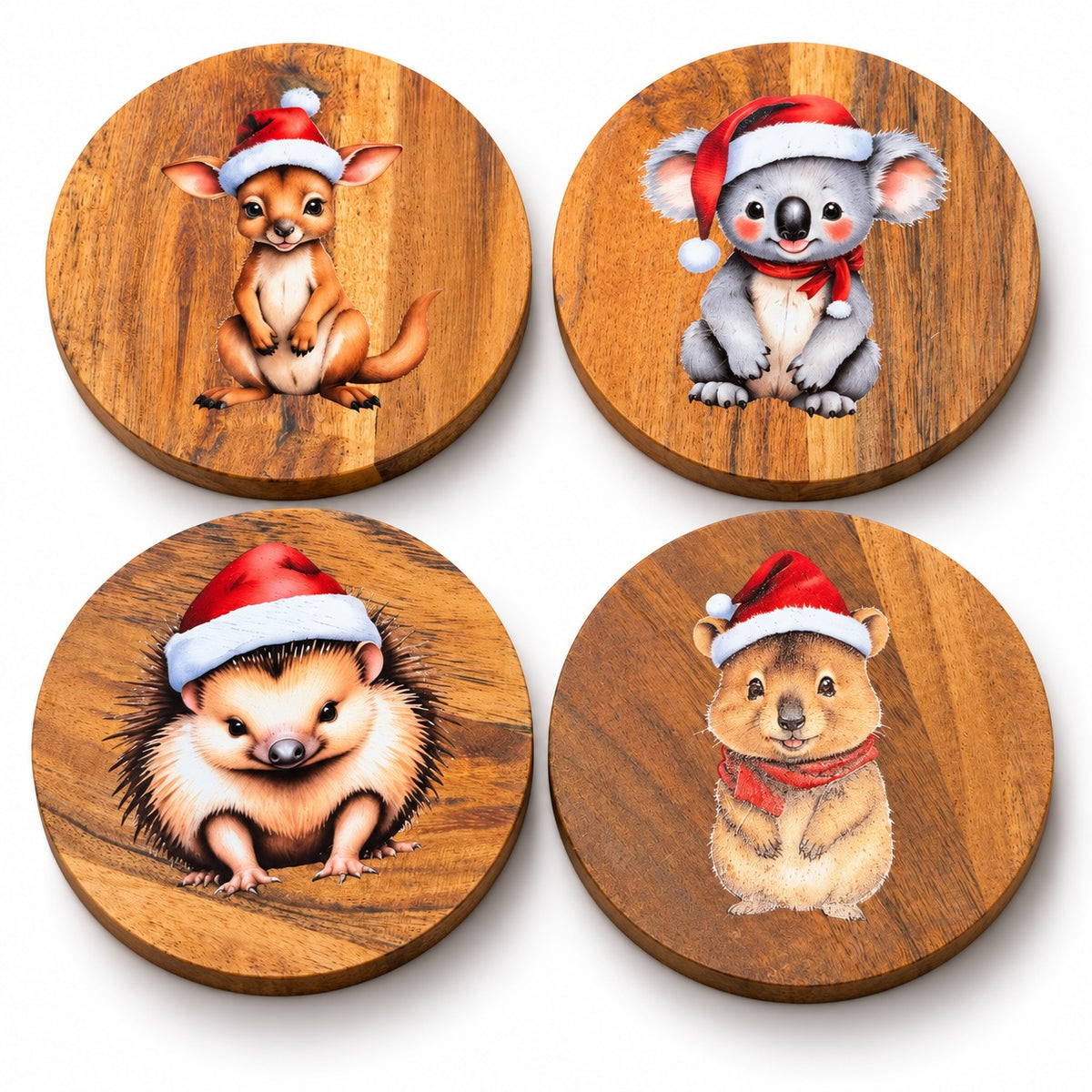 Set of four wooden Australian animal Christmas coasters with festive kangaroo, koala, echidna and quokka designs on a white background.