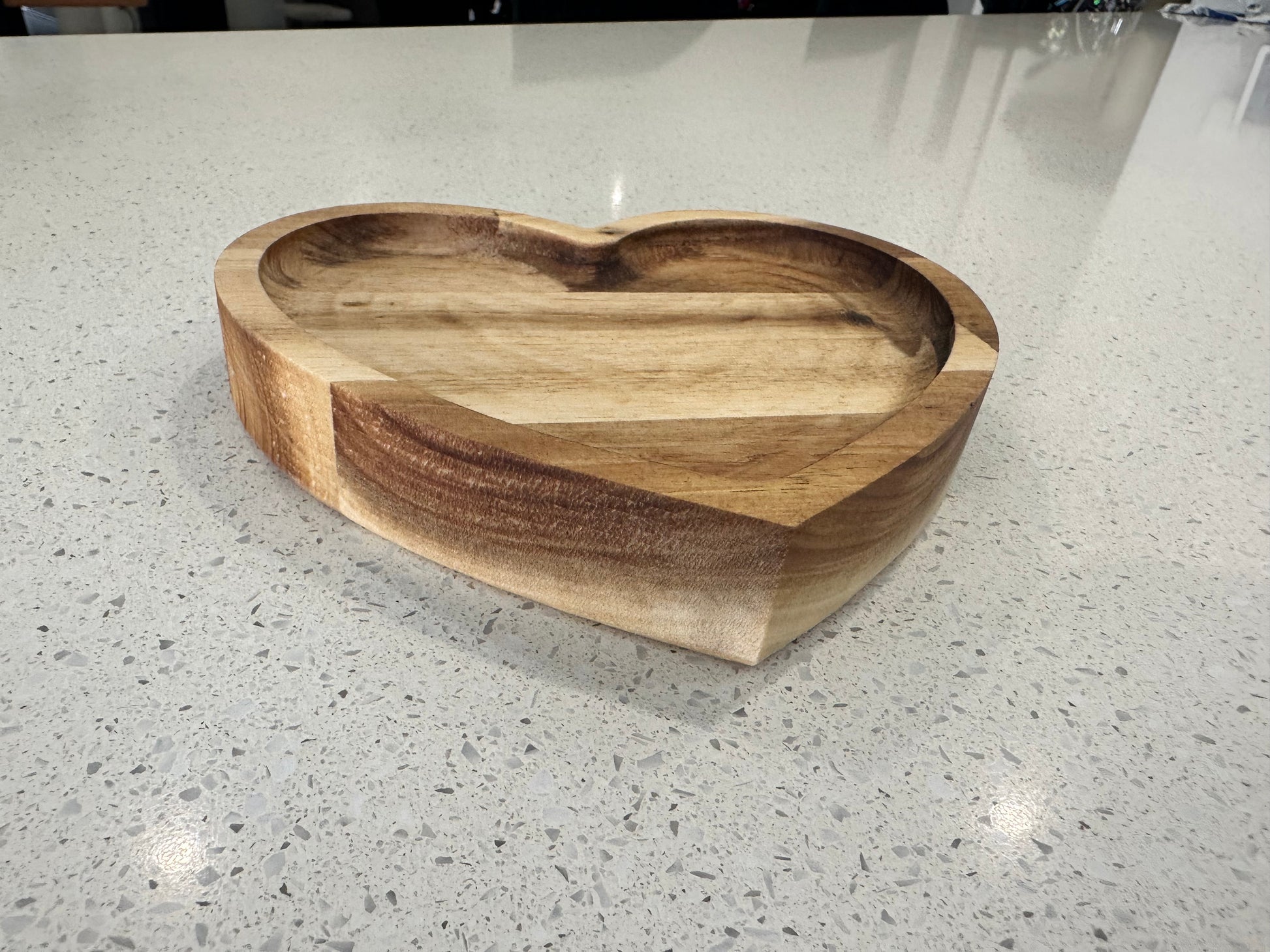 Acacia wood grain detail on heart shaped wooden jewellery tray