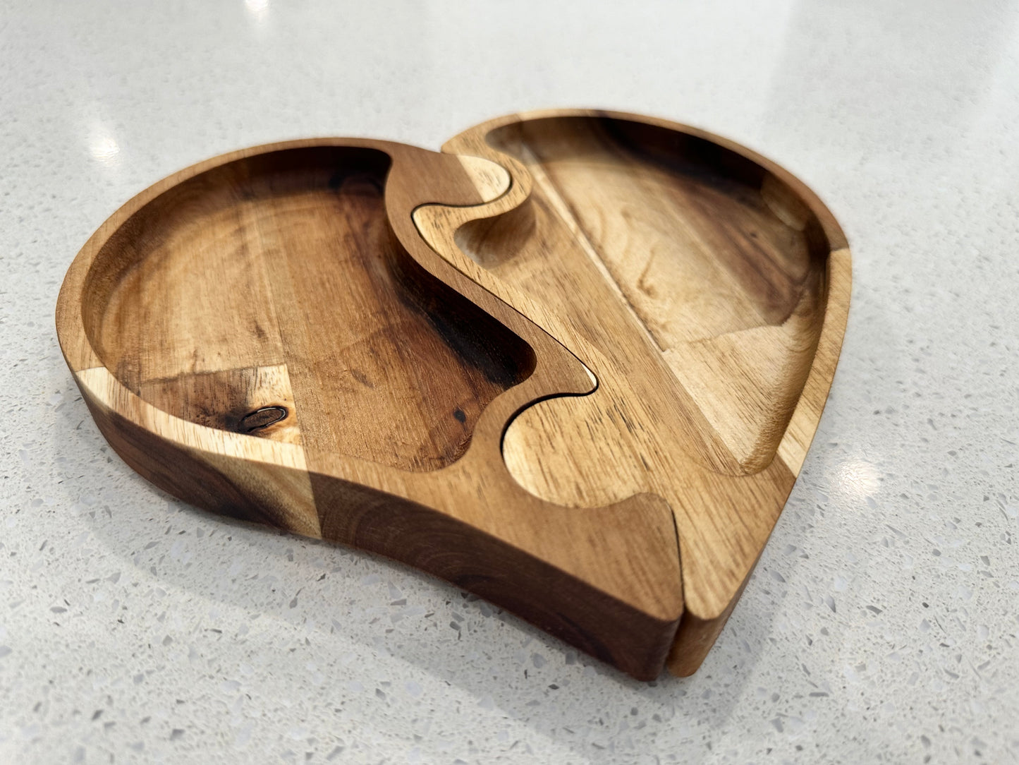 Two piece interlocking heart shaped wooden jewellery puzzle tray