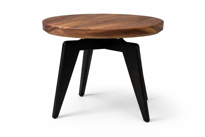 Round wooden coffee table with black metal cross legs.