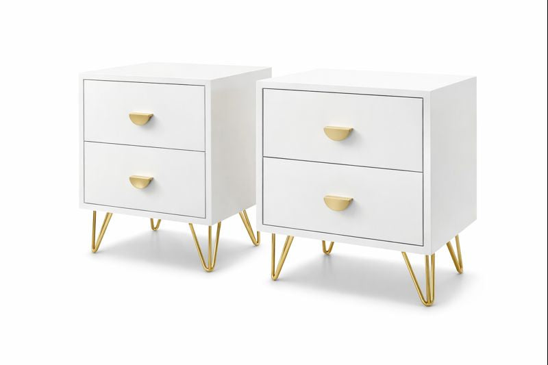 Pair of white bedside tables featuring gold handles and tapered legs.